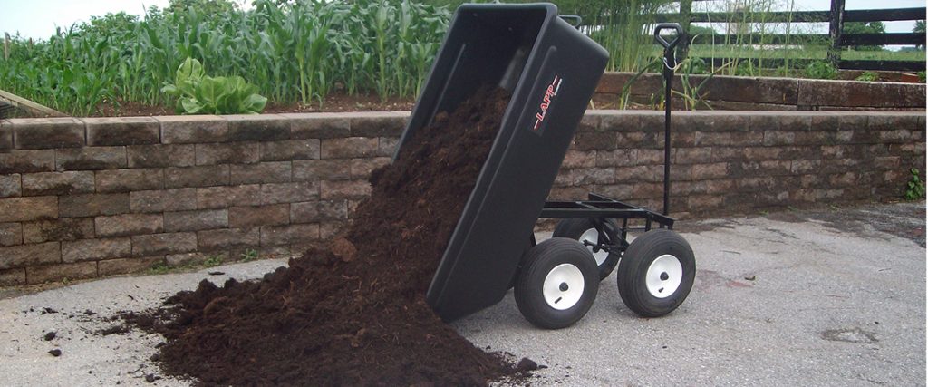 dump cart pouring mulch 1